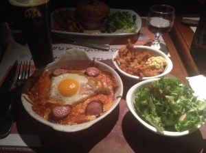 A Belgian specialty that includes an egg, ham, sausage, bread, and lots of cheese.  Ooh la la!