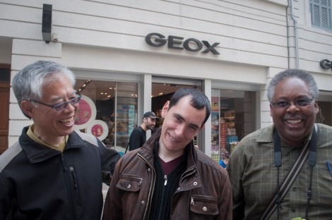 The men commiserate with Daniel when his wife walks into a shop...