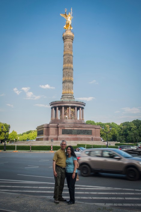 Mom and Dad Stand in Front of the Victory Column