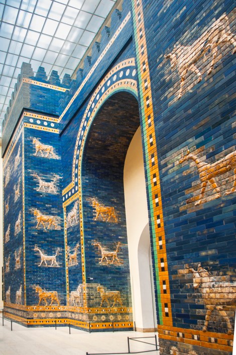 The visually stunning Ishtar Gate reconstructed from the ruins of Babylon.  It was originally built around 575 BCE by the order of King Nebuchadnezzar II and once considered one of the 7 wonders of the world.  This is the smaller frontal gate of an original double gate - the back part is deemed too large to fit into the constraints of the museum