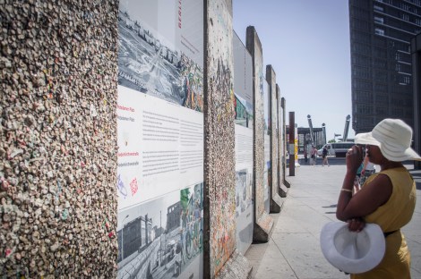 Thelma looks at what remains of the Berlin Wall
