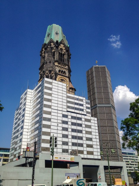 The Kaiser Wilhelm Memorial Church, built in the 1890's and damaged in a bombing raid in 1943. The church was largely destroyed, leaving only the shell of its spire and the entrance hall.